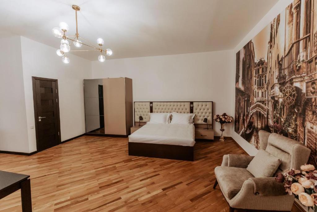 Voodi või voodid majutusasutuse Family Hotel toas