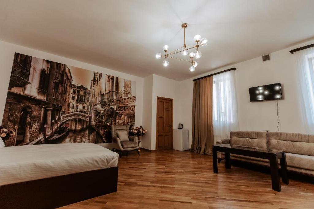 Voodi või voodid majutusasutuse Family Hotel toas