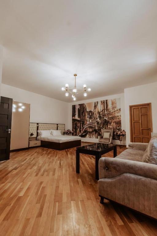 Voodi või voodid majutusasutuse Family Hotel toas