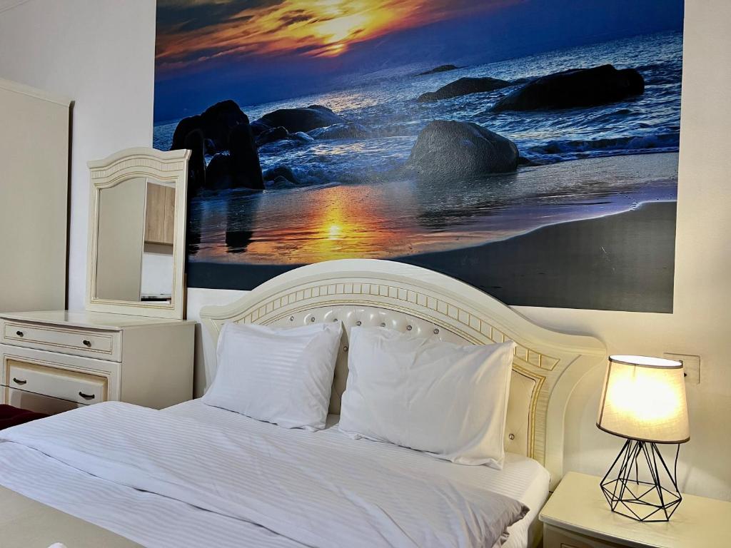 Voodi või voodid majutusasutuse Family Hotel toas