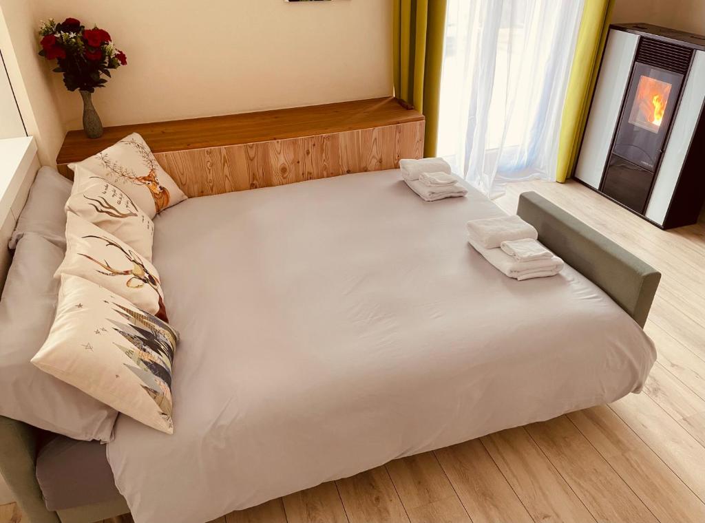 Postel nebo postele na pokoji v ubytování La Baita