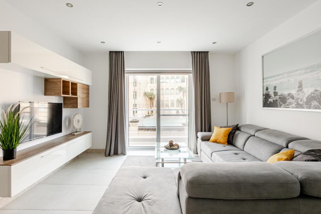 Posezení v ubytování Modern apartment direct access to Sliema beaches