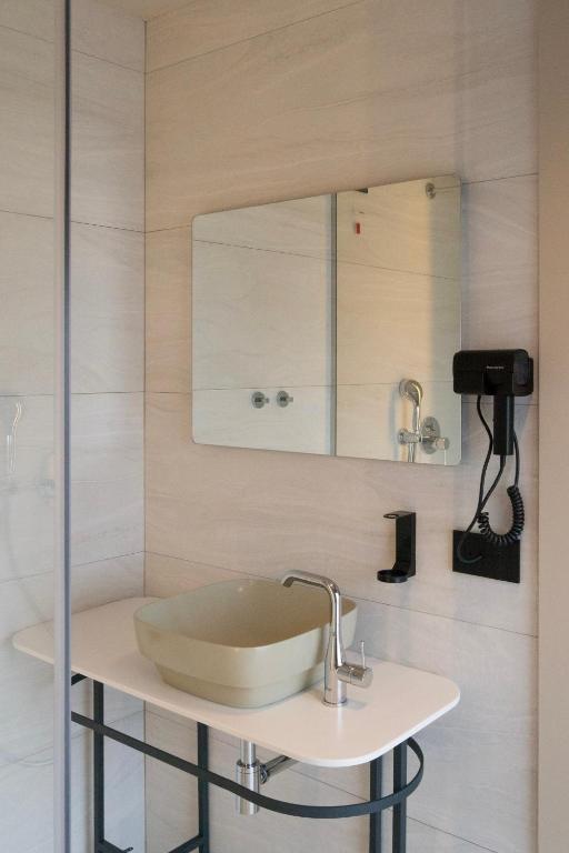 Koupelna v ubytování Si Hotel Tirana