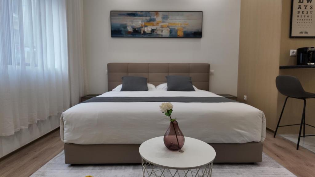 Postel nebo postele na pokoji v ubytování CC LUX Suites