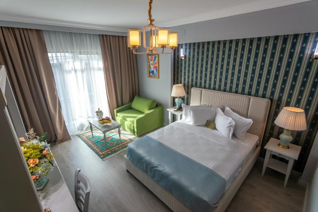 Postel nebo postele na pokoji v ubytování Phoenicia Express Hotel