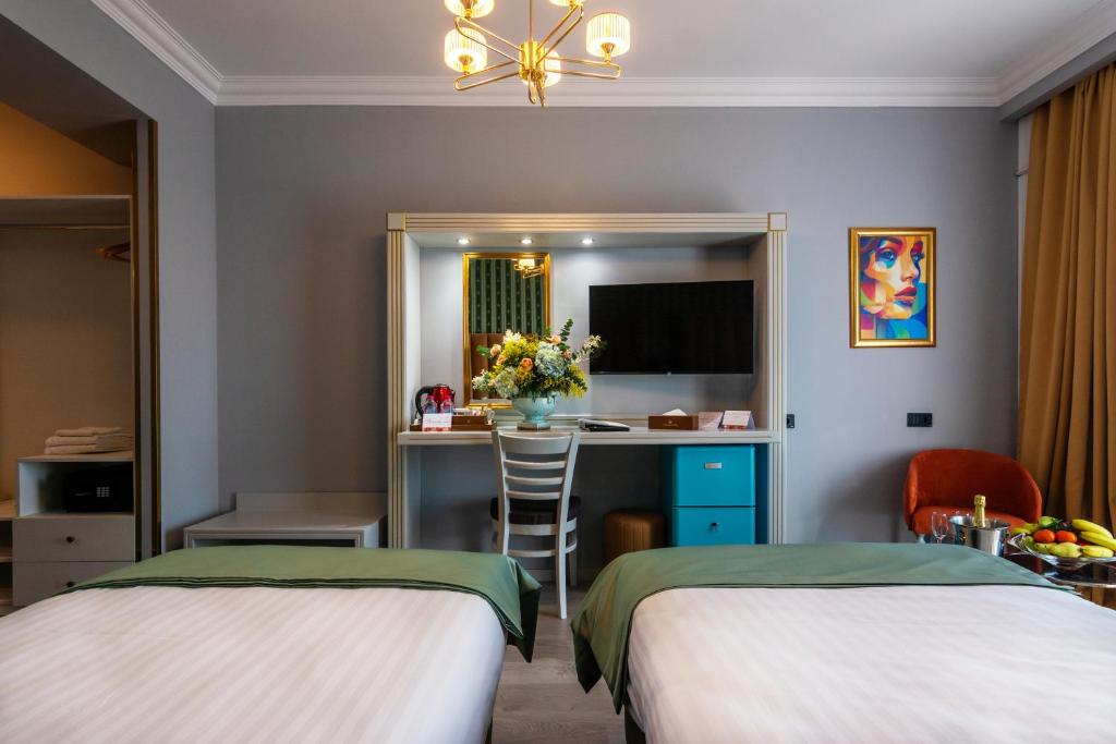 Postel nebo postele na pokoji v ubytování Phoenicia Express Hotel