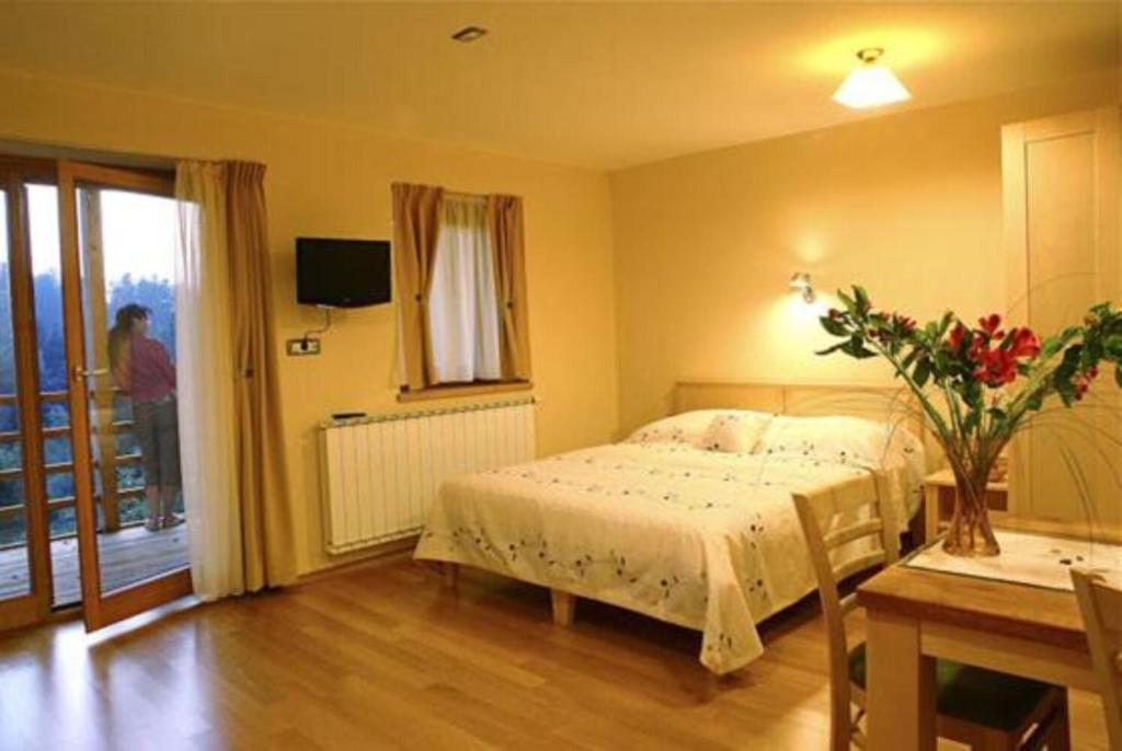 Postel nebo postele na pokoji v ubytování Posestvo Laz - The Laz Estate