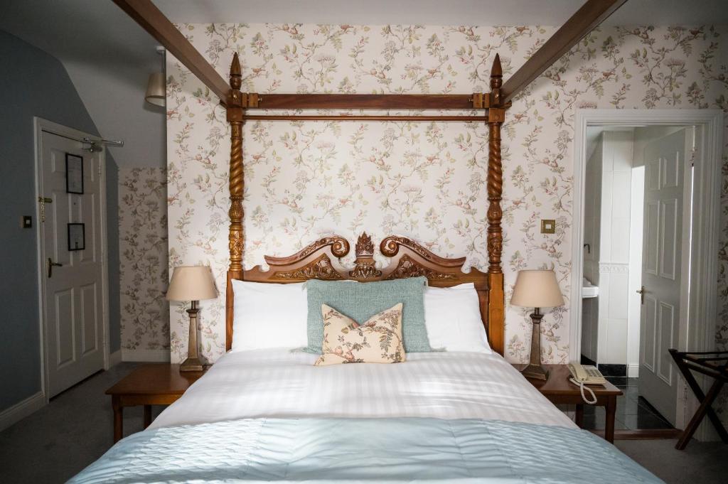Postel nebo postele na pokoji v ubytování Carrygerry Country House