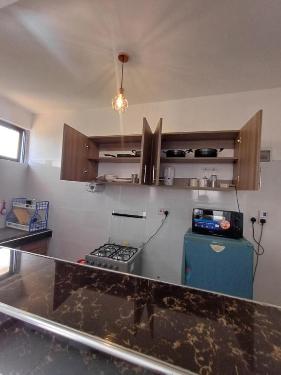 Kuchyň nebo kuchyňský kout v ubytování Havy Homes 2