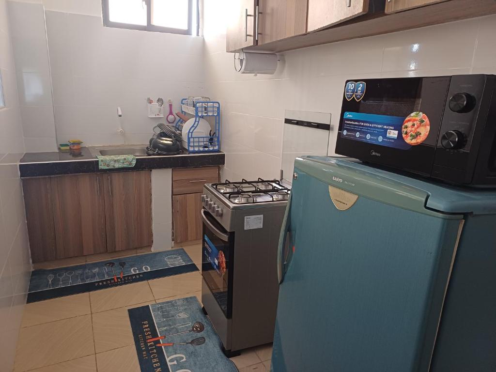 Kuchyň nebo kuchyňský kout v ubytování Havy Homes 2