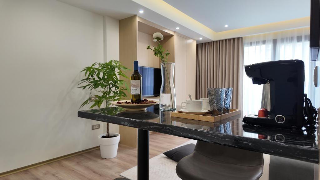 TV a/nebo společenská místnost v ubytování CC LUX Suites