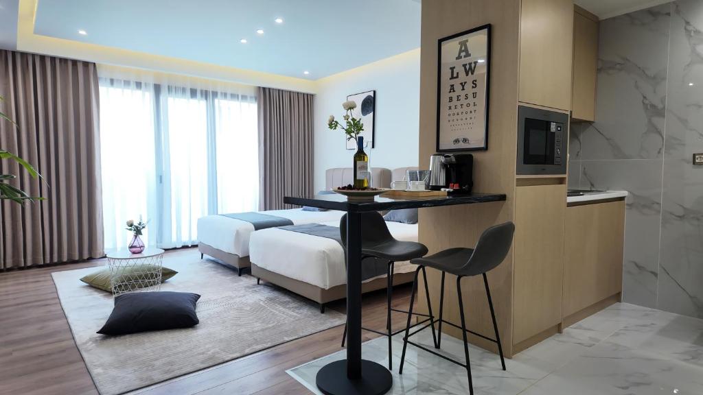 TV a/nebo společenská místnost v ubytování CC LUX Suites