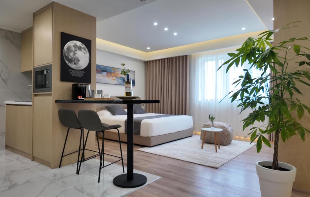 Postel nebo postele na pokoji v ubytování CC LUX Suites