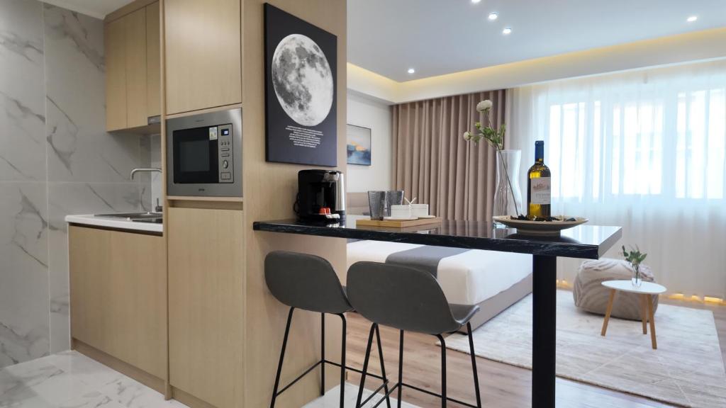 TV a/nebo společenská místnost v ubytování CC LUX Suites
