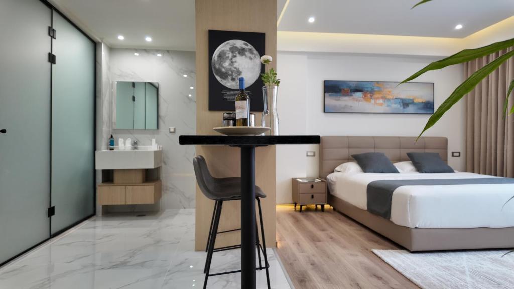 Postel nebo postele na pokoji v ubytování CC LUX Suites