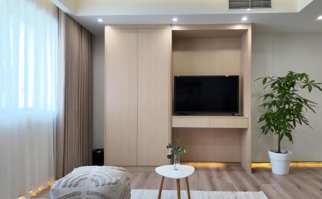 TV a/nebo společenská místnost v ubytování CC LUX Suites