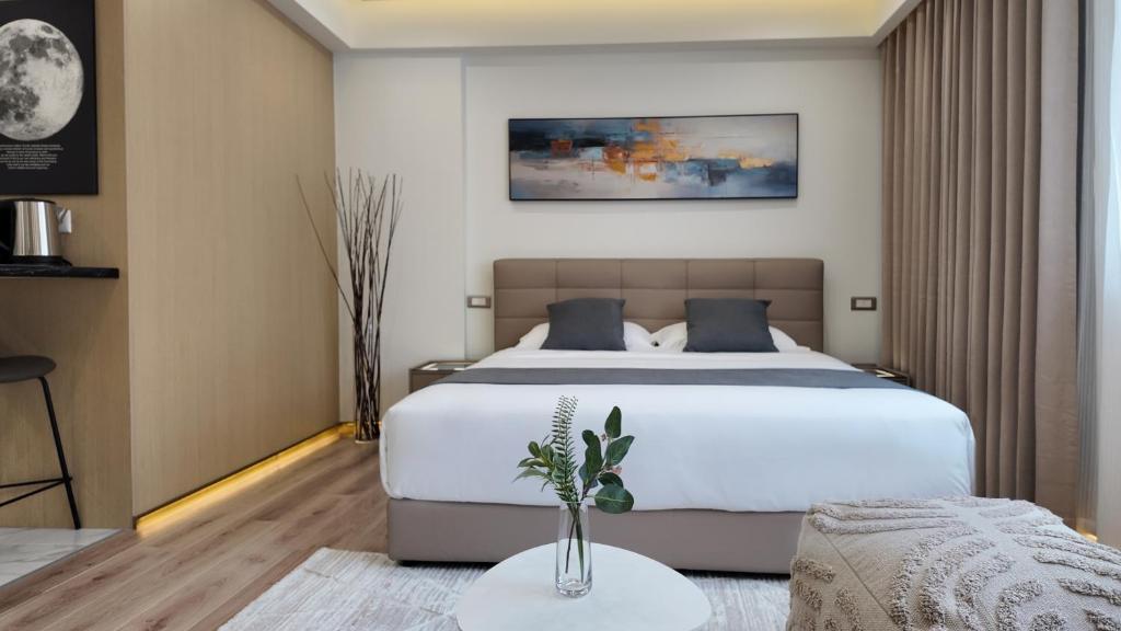 Postel nebo postele na pokoji v ubytování CC LUX Suites