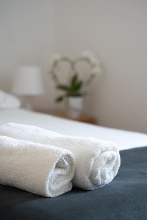 Postel nebo postele na pokoji v ubytování Hotel Tabor