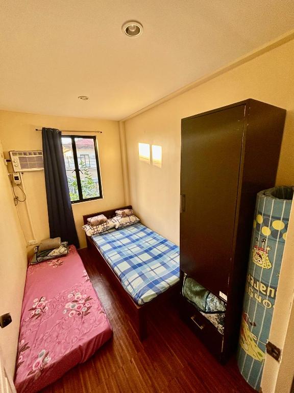Affordable Fully Furnished House with 3 Bedroom for Family and Big Groups客房内的一张或多张床位
