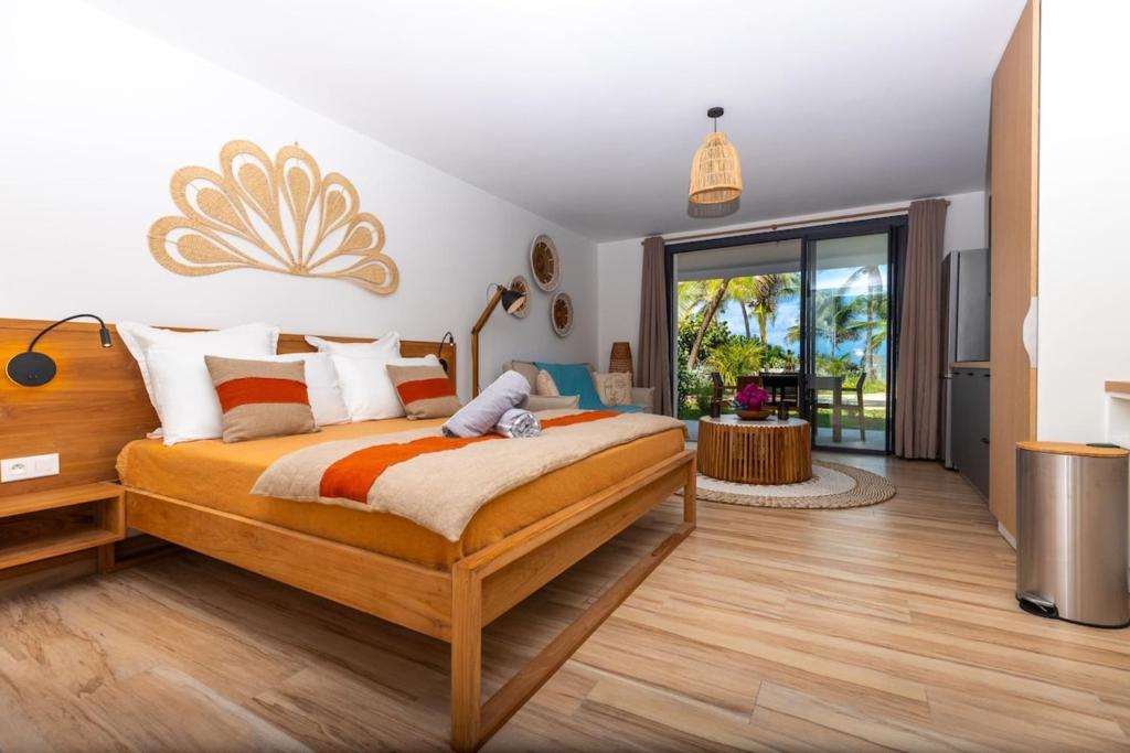 Postel nebo postele na pokoji v ubytování Studio 8 - Alamanda Resort