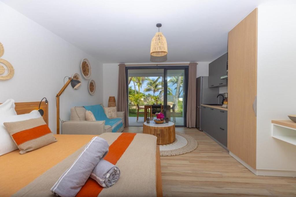 Postel nebo postele na pokoji v ubytování Studio 8 - Alamanda Resort