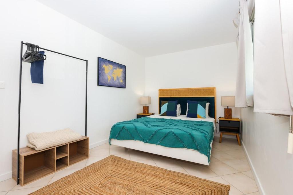 Postel nebo postele na pokoji v ubytování Watalibi - Beachfront apartment Grand-Case