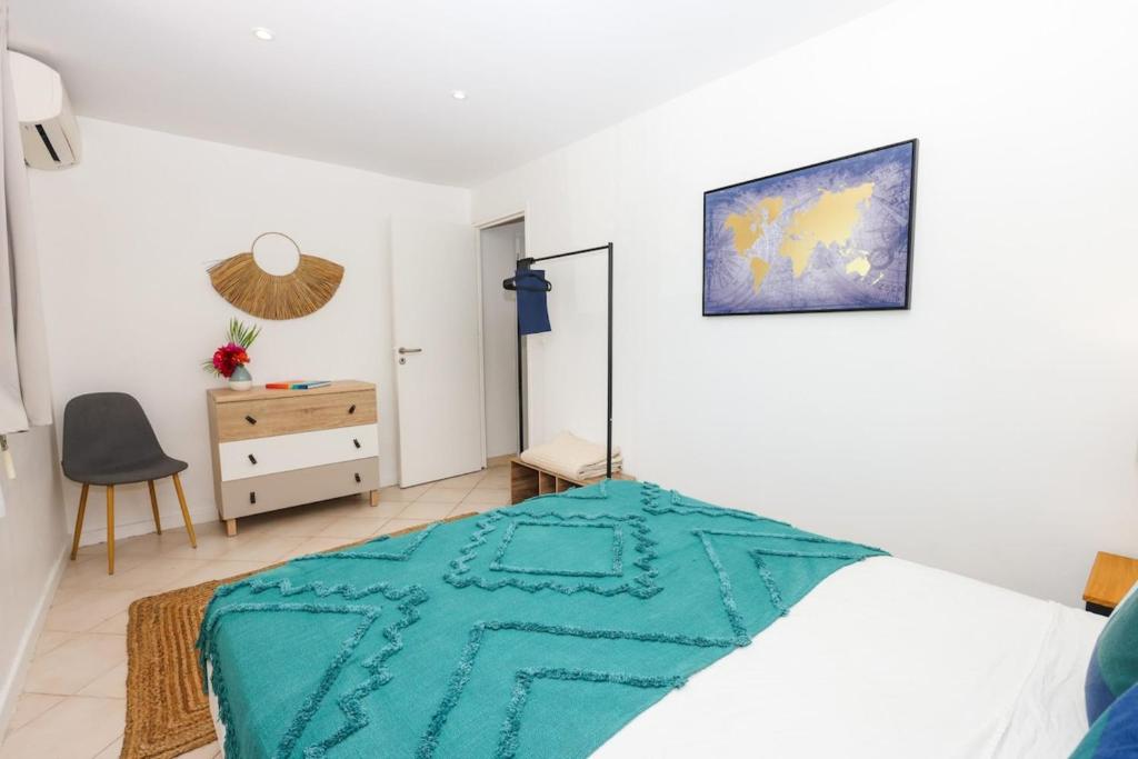 Postel nebo postele na pokoji v ubytování Watalibi - Beachfront apartment Grand-Case
