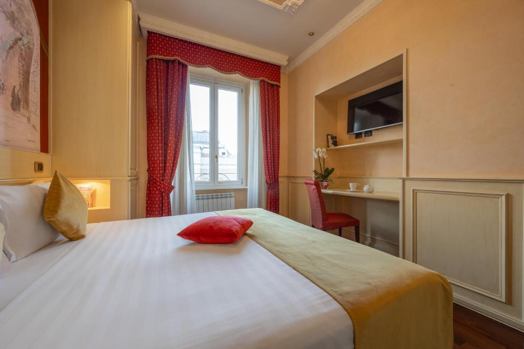 Posteľ alebo postele v izbe v ubytovaní Al Viminale Hill Inn & Hotel