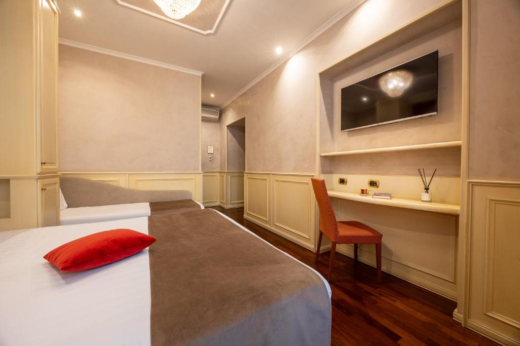 Posteľ alebo postele v izbe v ubytovaní Al Viminale Hill Inn & Hotel