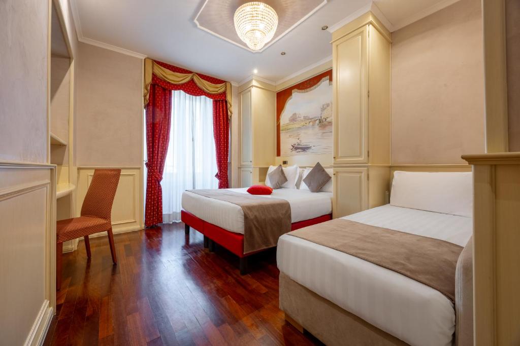 Posteľ alebo postele v izbe v ubytovaní Al Viminale Hill Inn & Hotel