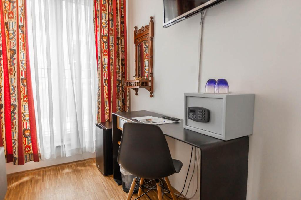 TV a/nebo společenská místnost v ubytování Hotel Freischütz