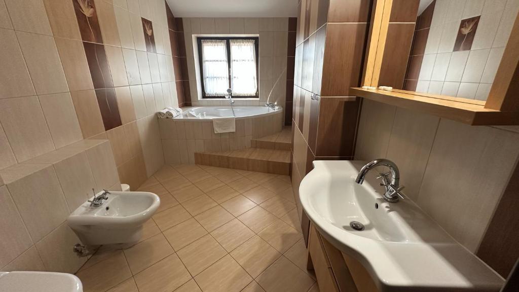 Kúpeľňa v ubytovaní Pensjonat Bobrowy Dwór