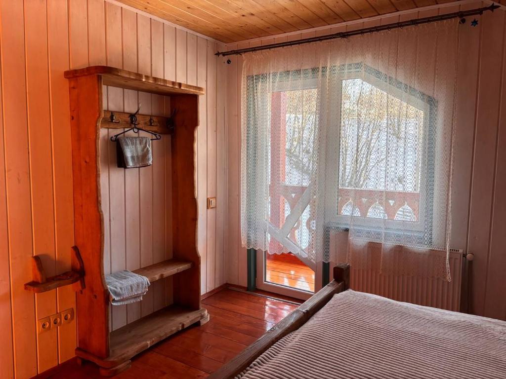 Postel nebo postele na pokoji v ubytování Садиба Кичера