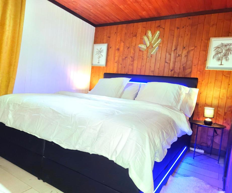Postel nebo postele na pokoji v ubytování L'appel Chalet