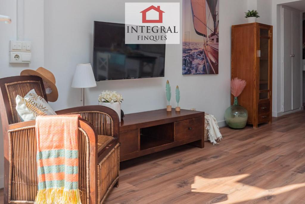 Televízia a/alebo spoločenská miestnosť v ubytovaní Apartament BellPort