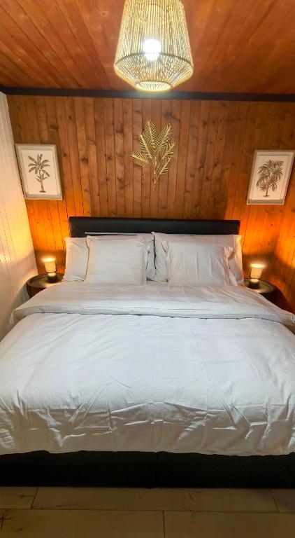 Postel nebo postele na pokoji v ubytování L'appel Chalet