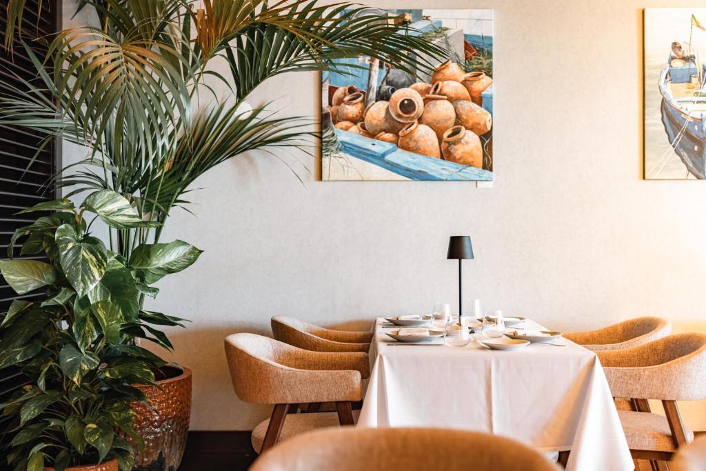 Uma área de estar em Real Marina Hotel & Spa