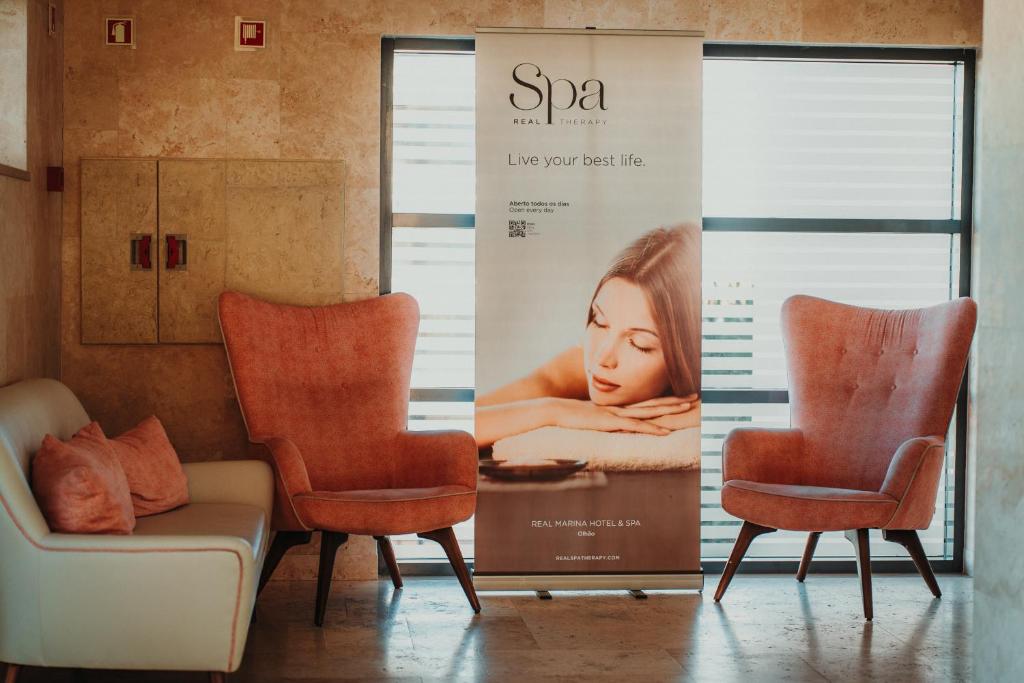 Uma área de estar em Real Marina Hotel & Spa