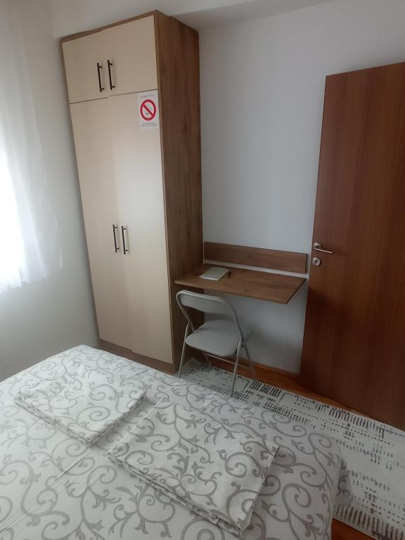 Postel nebo postele na pokoji v ubytování Apartman Dunja i Petar