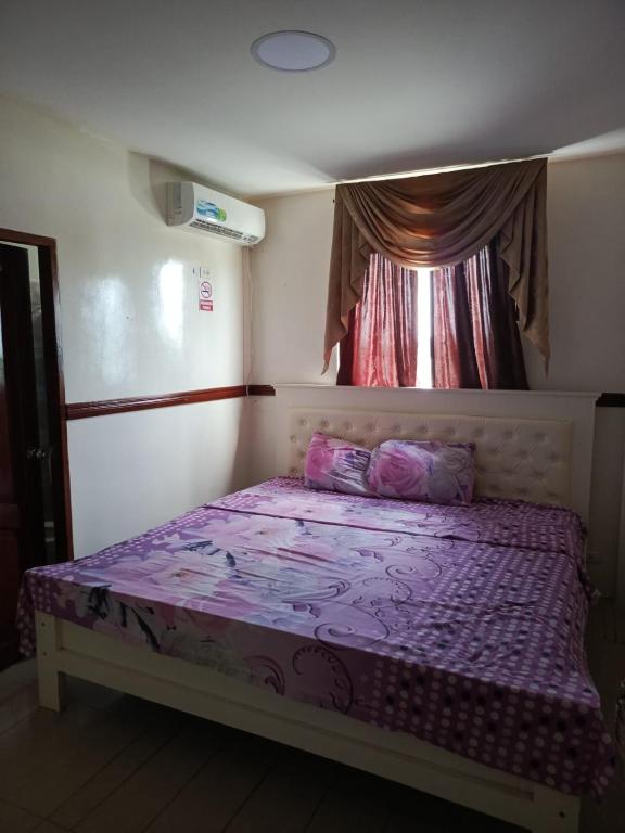 Postel nebo postele na pokoji v ubytování Hotel Rumbo al Sol