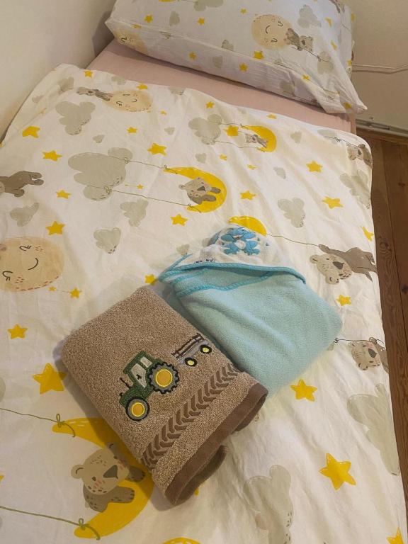 Letto o letti in una camera di Apartmány Dolní Vítkov