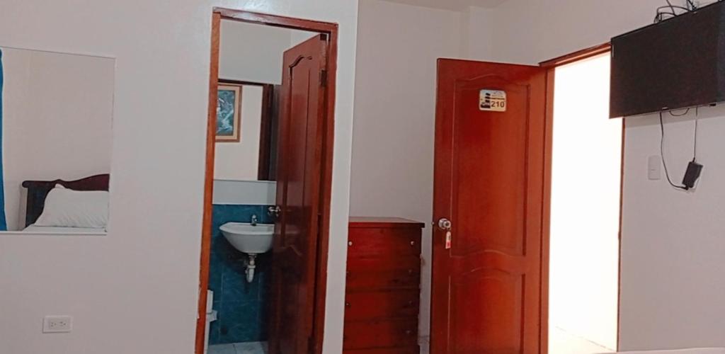 TV a/nebo společenská místnost v ubytování Hotel Rumbo al Sol