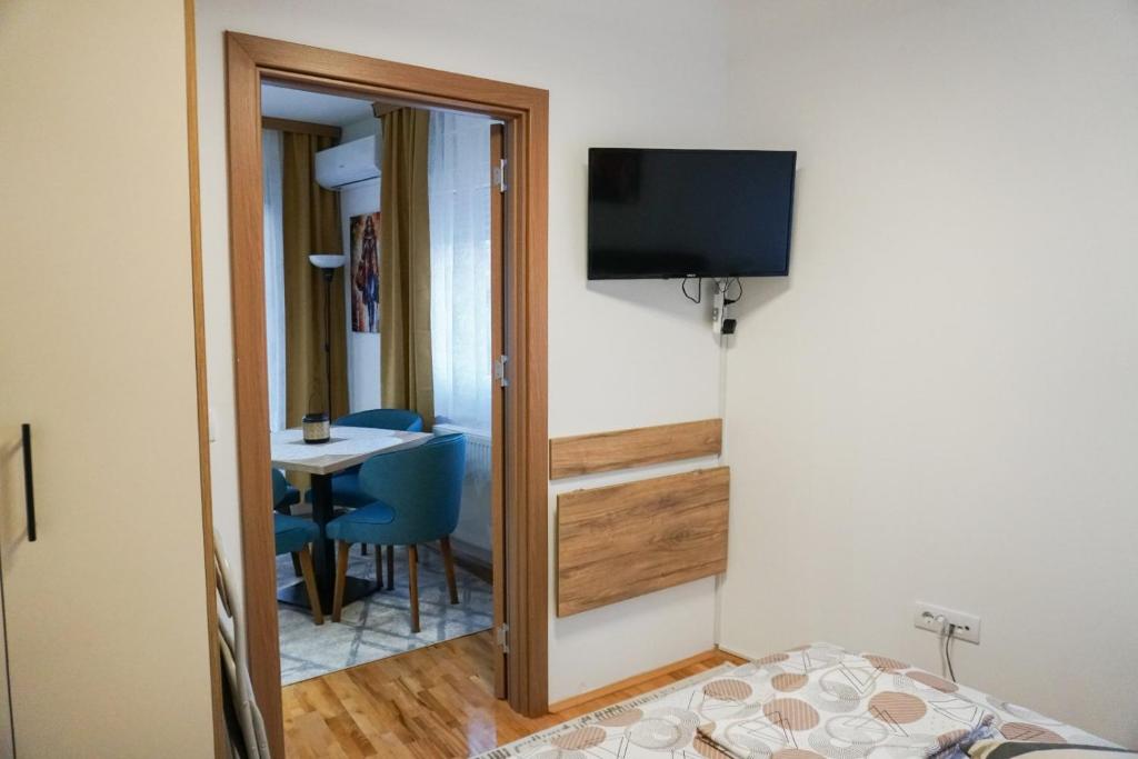 TV a/nebo společenská místnost v ubytování Apartman Dunja i Petar