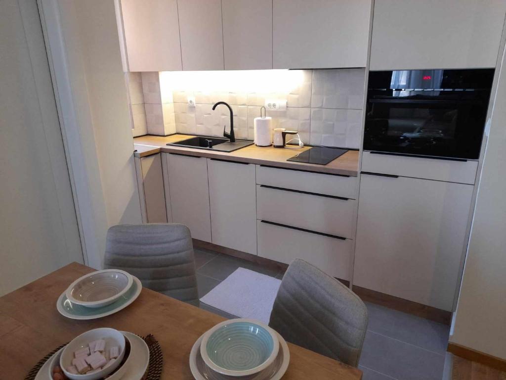 Cucina o angolo cottura di Relax sauna apartman