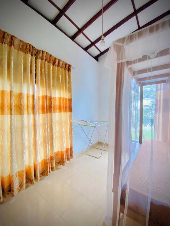 Postel nebo postele na pokoji v ubytování Miringa homestay
