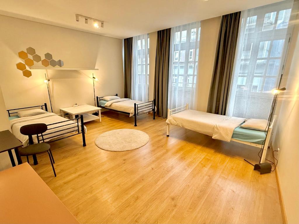 Ένα ή περισσότερα κρεβάτια σε δωμάτιο στο Âmbar Guest House