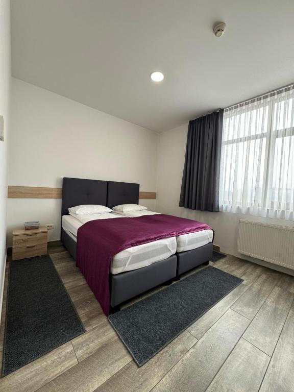 Postel nebo postele na pokoji v ubytování Apartments R Sport boutique