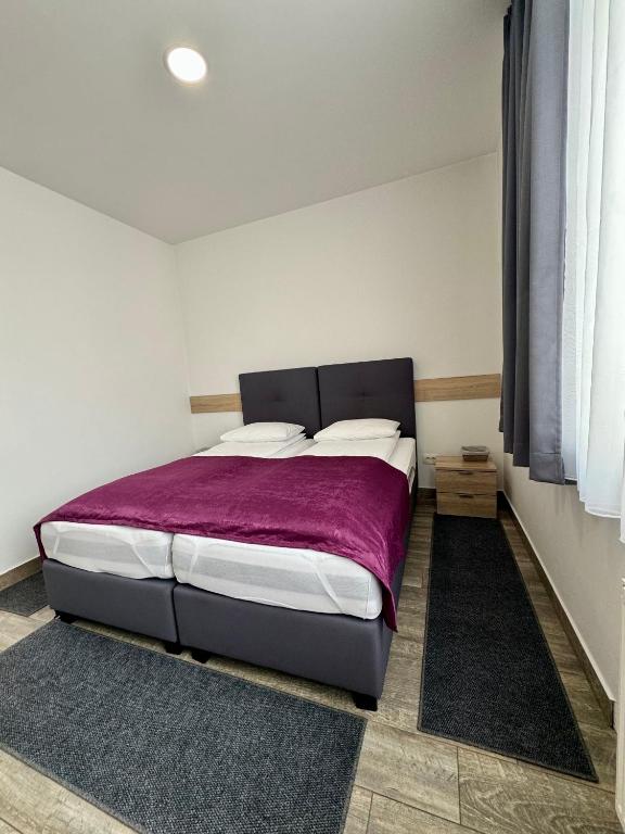 Postel nebo postele na pokoji v ubytování Apartments R Sport boutique