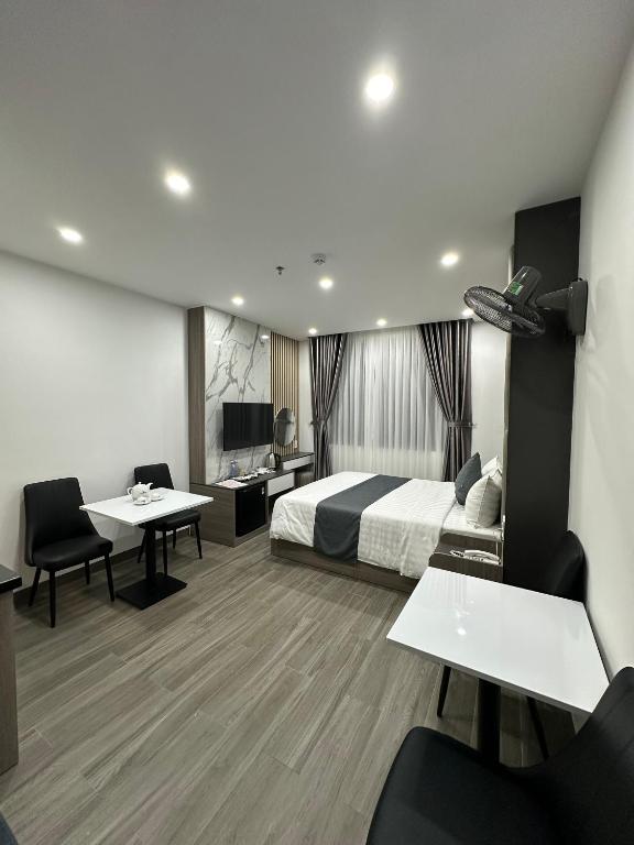 TV a/nebo společenská místnost v ubytování Seven Stars Hotel & Apartment