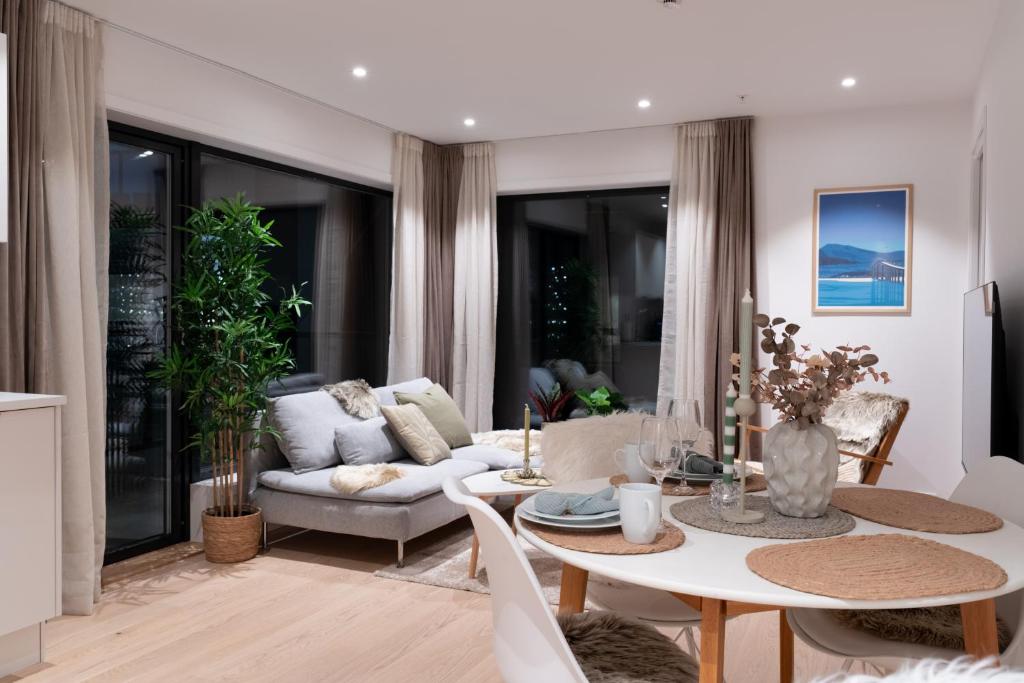 Et opholdsområde på Moderne leilighet ved sjøkanten